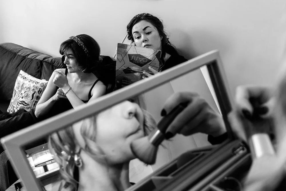 A bridesmaid&rsquo;s make-up reflected in a mirror before a Brighton Town Hall wedding