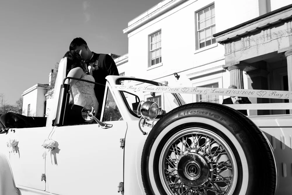 The vintage wedding car outside Calderstones Mansion House