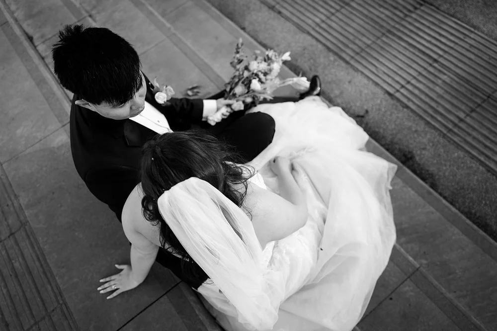 Luisa&rsquo;s dress spread out during couple portraits at Calderstones