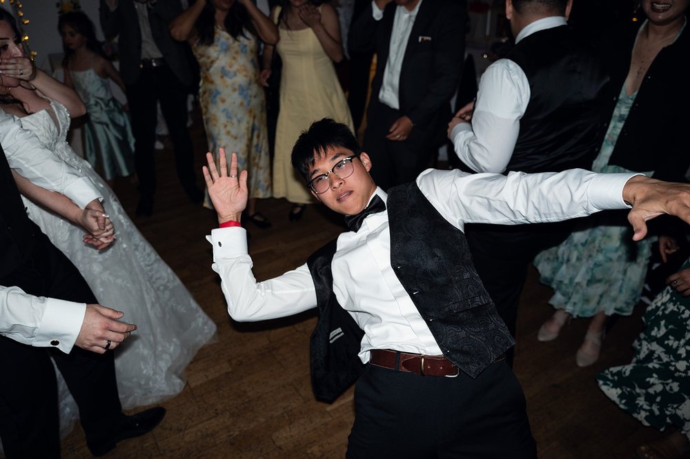 Guests dancing during the Colombian crazy hour at a Liverpool wedding