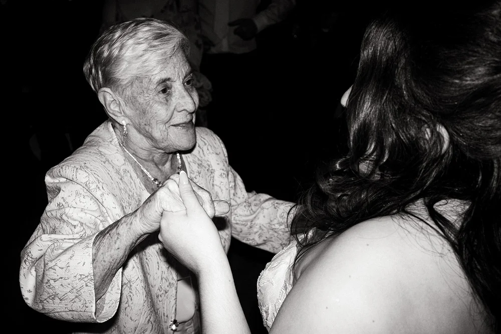 Two generations dancing together at a Liverpool wedding
