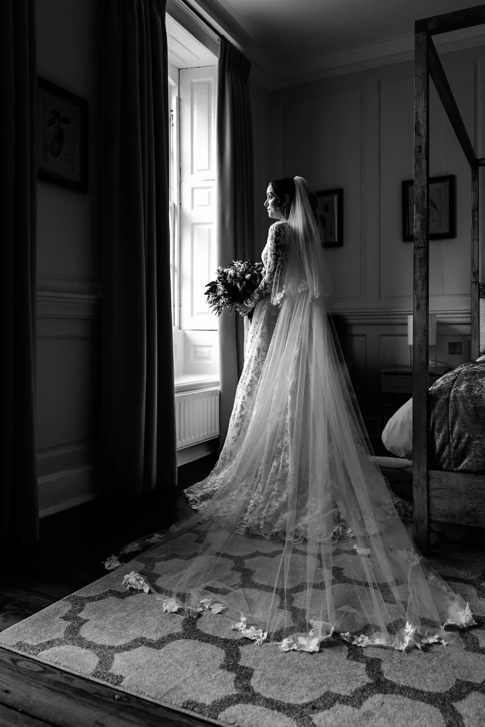 Bride walking down the aisle towards her partner in a beautifully decorated ceremony room &mdash; emotional wedding moment