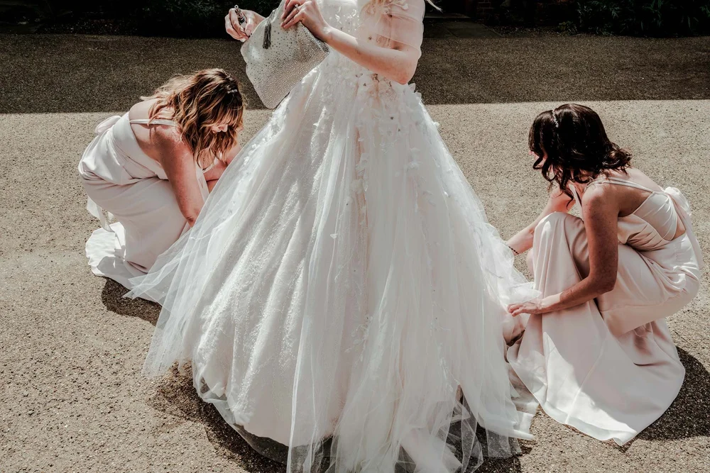 Wedding guests dancing energetically at the evening reception &mdash; lively dance floor photography
