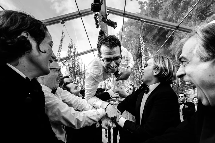 Guests sharing heartfelt emotions during wedding day — candid reportage photography by Oliver Holder