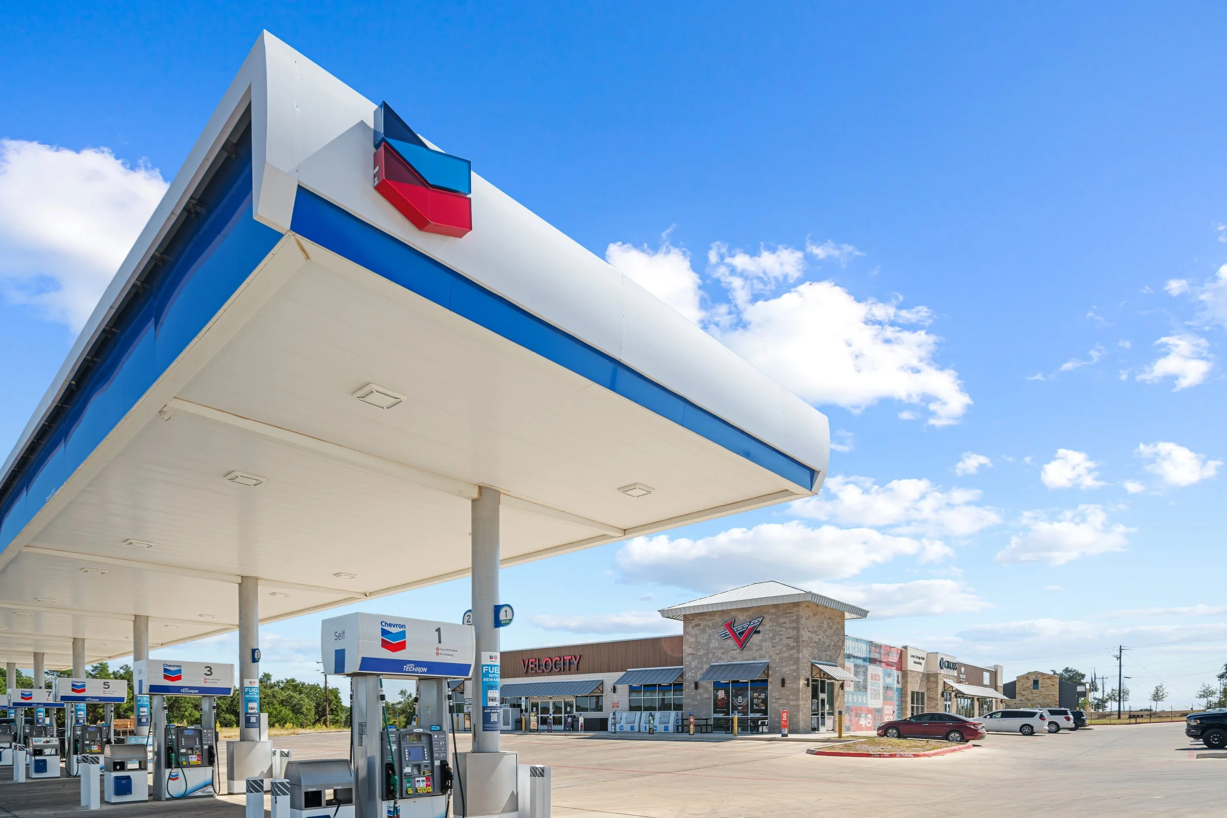 view of gas station canopy and convenience store