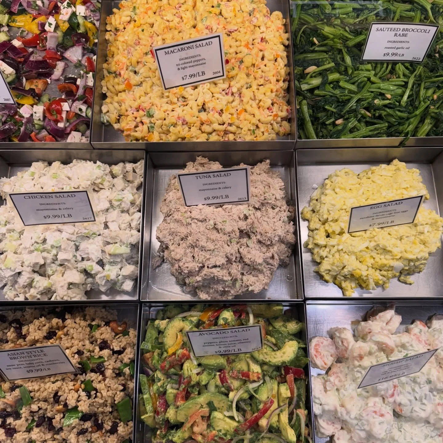 The case is stacked and ready.

Macaroni salad, potato salad, Mediterranean green lentil, cranberry apple quinoa, couscous, kale and cucumber, mozzarella and tomato, oven roasted cauliflower, broccoli rabe, tuna, chicken, egg, shrimp, avocado and mor