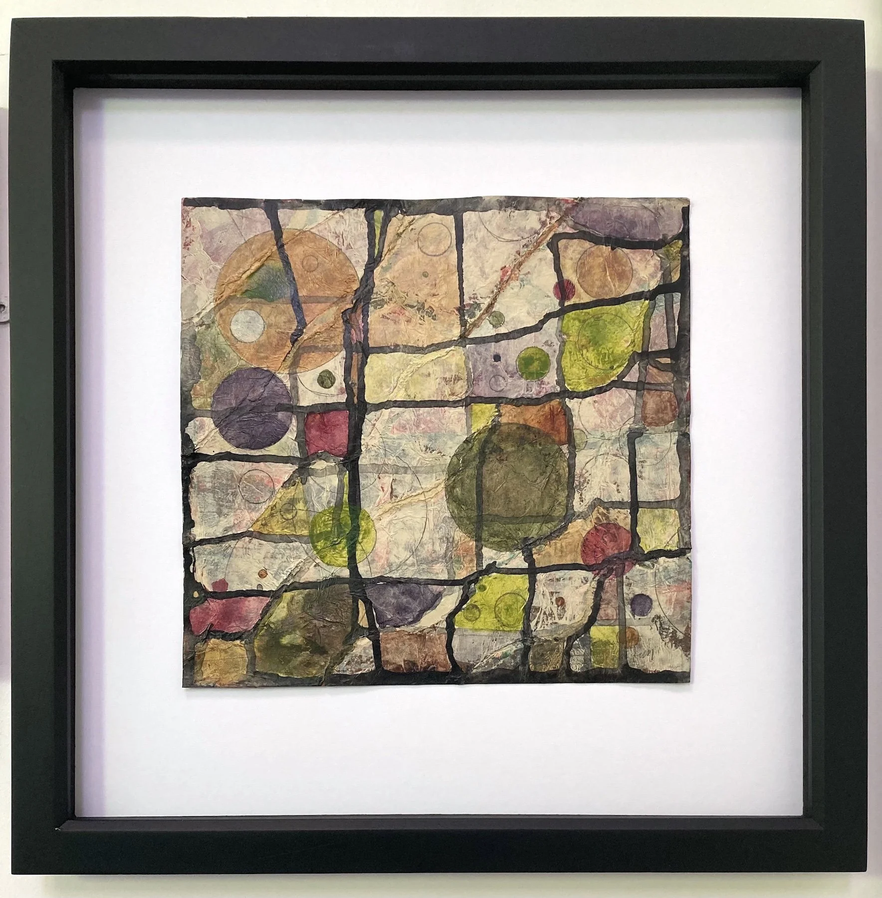 In the Fields, Acrylic and mixed-media on paper, float mounted in black frame approximately 42cm square, by Lucy Mathers. £210.