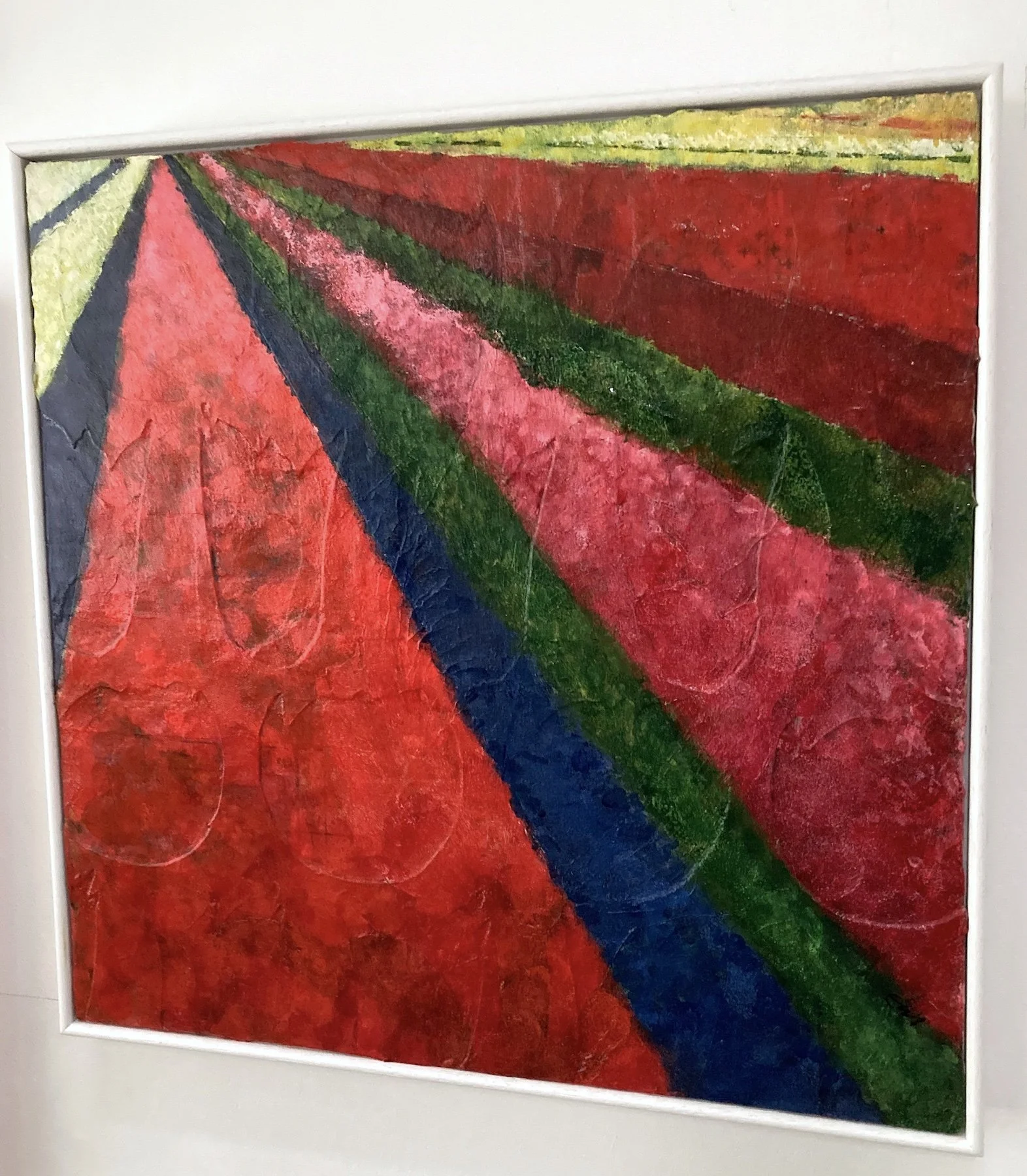 Photograph of Lucy Mathers' painting called Tulimpsest hanging on a wall