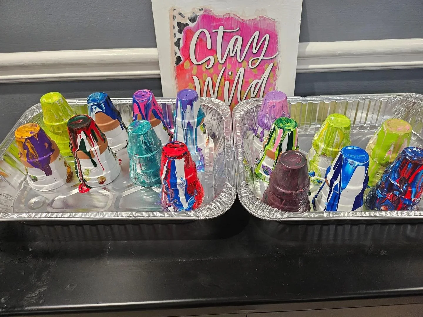 A little paint, a lot of creativity, and plenty of fun! 🎨🪴 We loved creating our one-of-a-kind acrylic pour flower pots with our friends at Chapters Living of Buford! 💕✨ #CaritasHospice