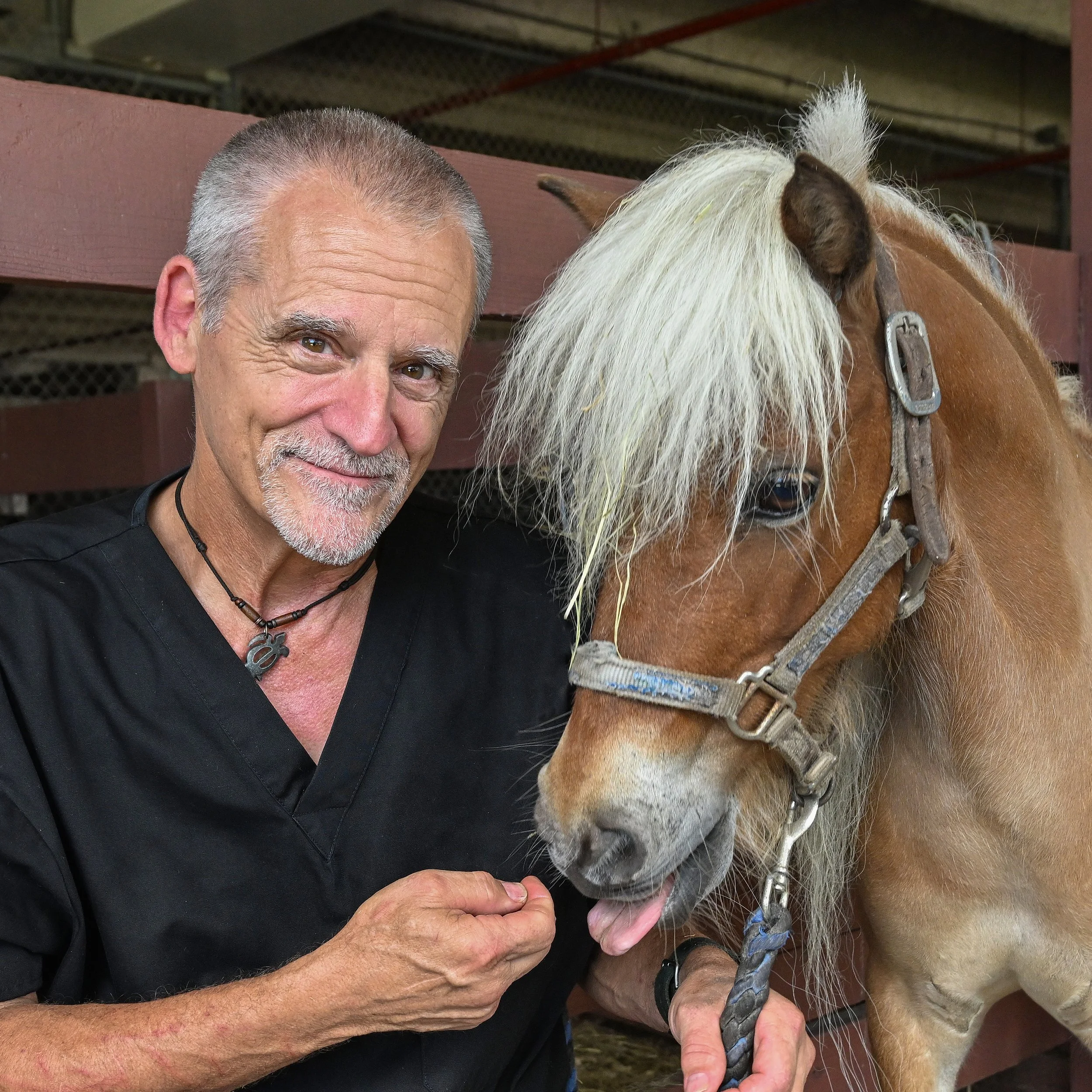 DOUG AND MINI HORSE.jpg
