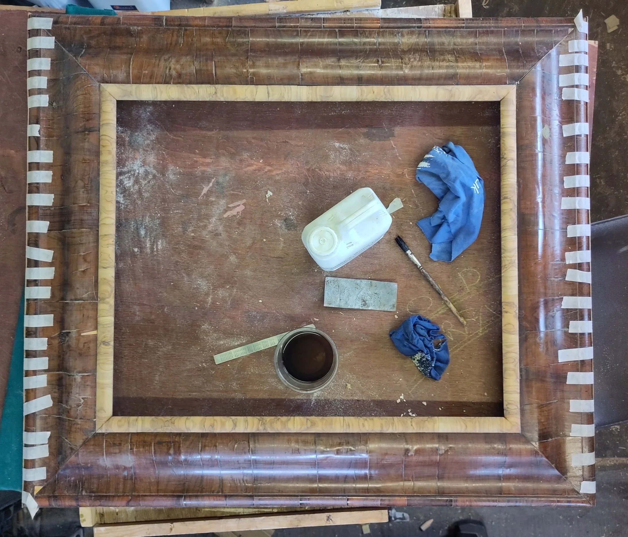 Researched the appropriate period profile and replaced the missing crossbanded inner moulding accordingly.