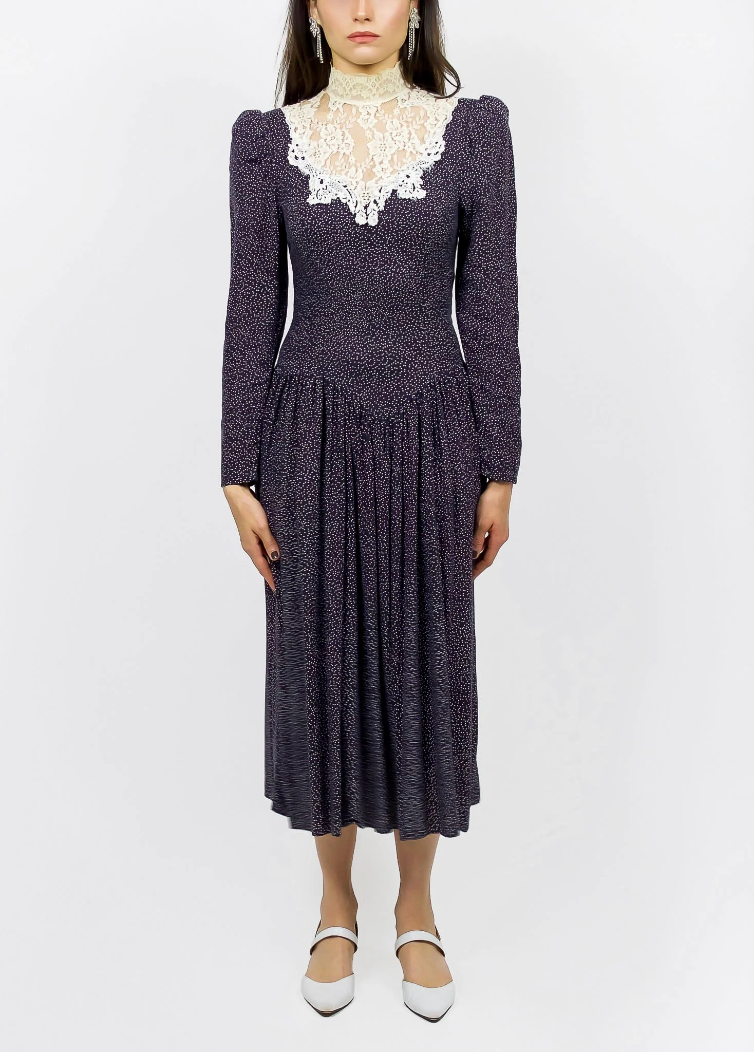 collector of vision mode wearing size small navy blue long sleeve bouffant dress with lace mock neckline, puff long sleeves, white leather kitten pointed toe heel