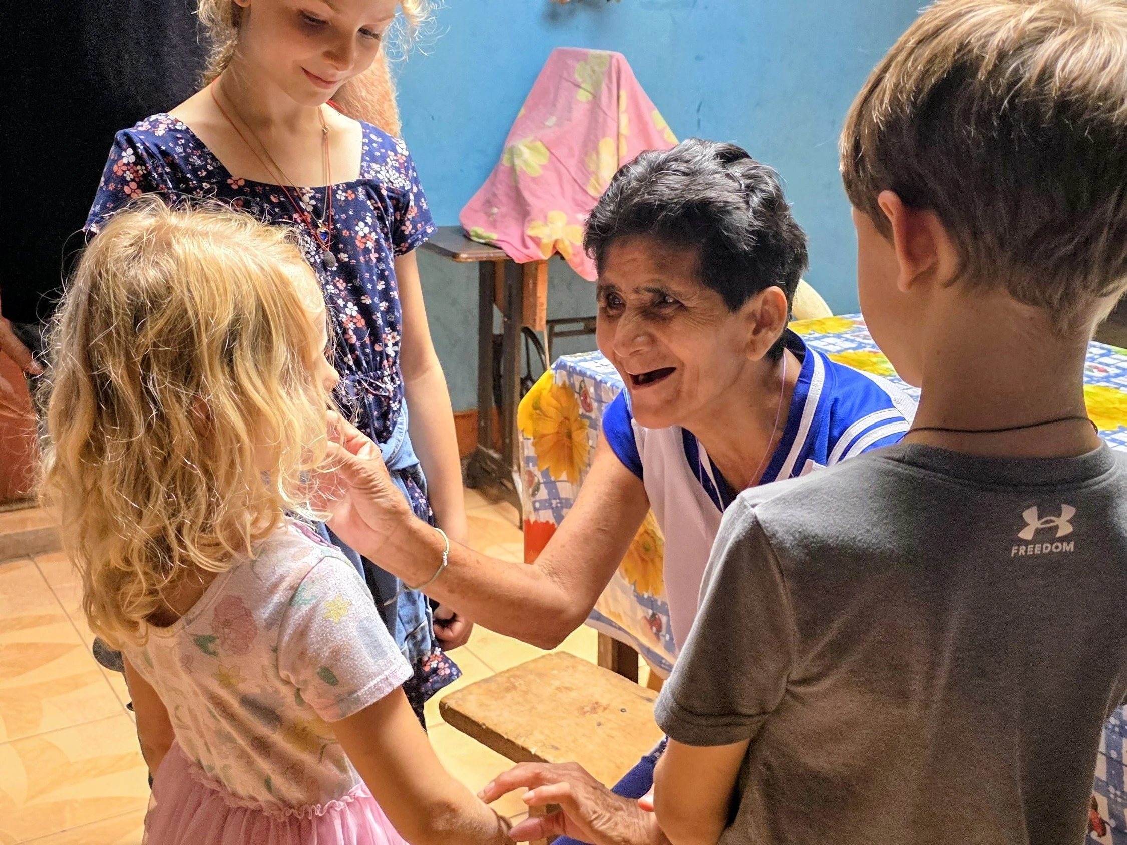 PERU - Erisman kids during home visit.jpg