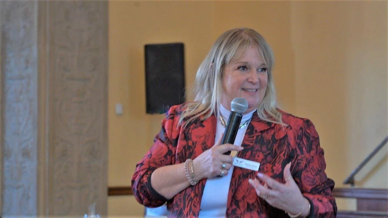 Theresa Flores, founder of The SOAP Project, speaking during a community presentation on human trafficking awareness.