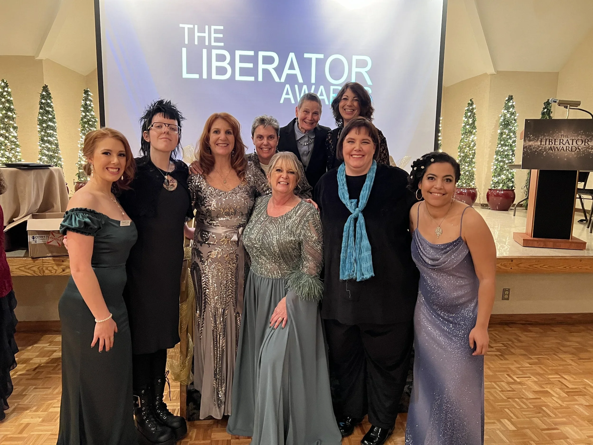 Recipients and organizers gather at The SOAP Project's 12th Annual Liberator Awards honoring individuals and organizations fighting human trafficking.