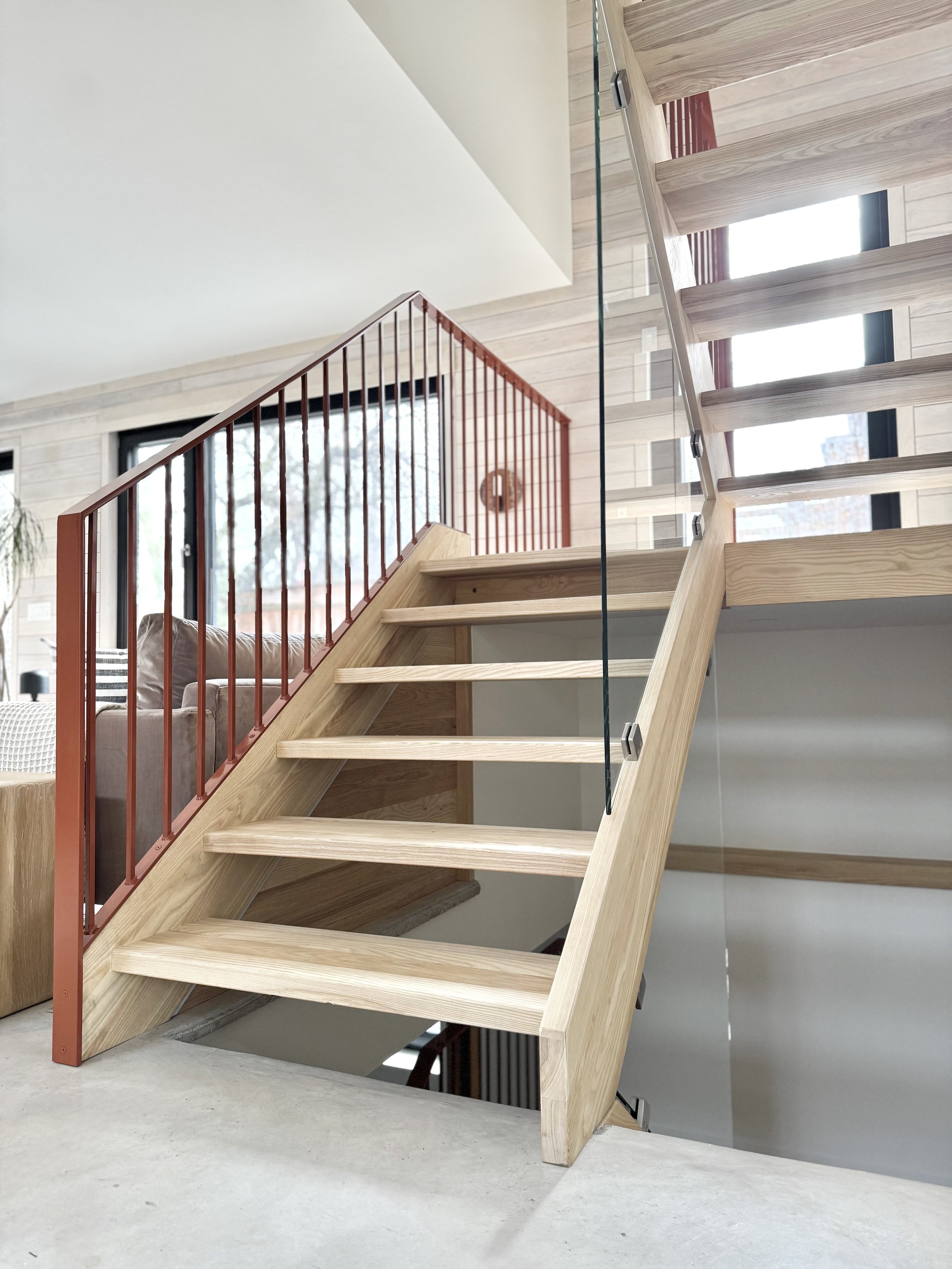 HH51-hinterhaus-41-stratford-ontario-open-stair-risers-rust-iron-railings-nordic-interiors-scandinavian-accessory-dwelling-unit-heated-concrete-floors.jpeg