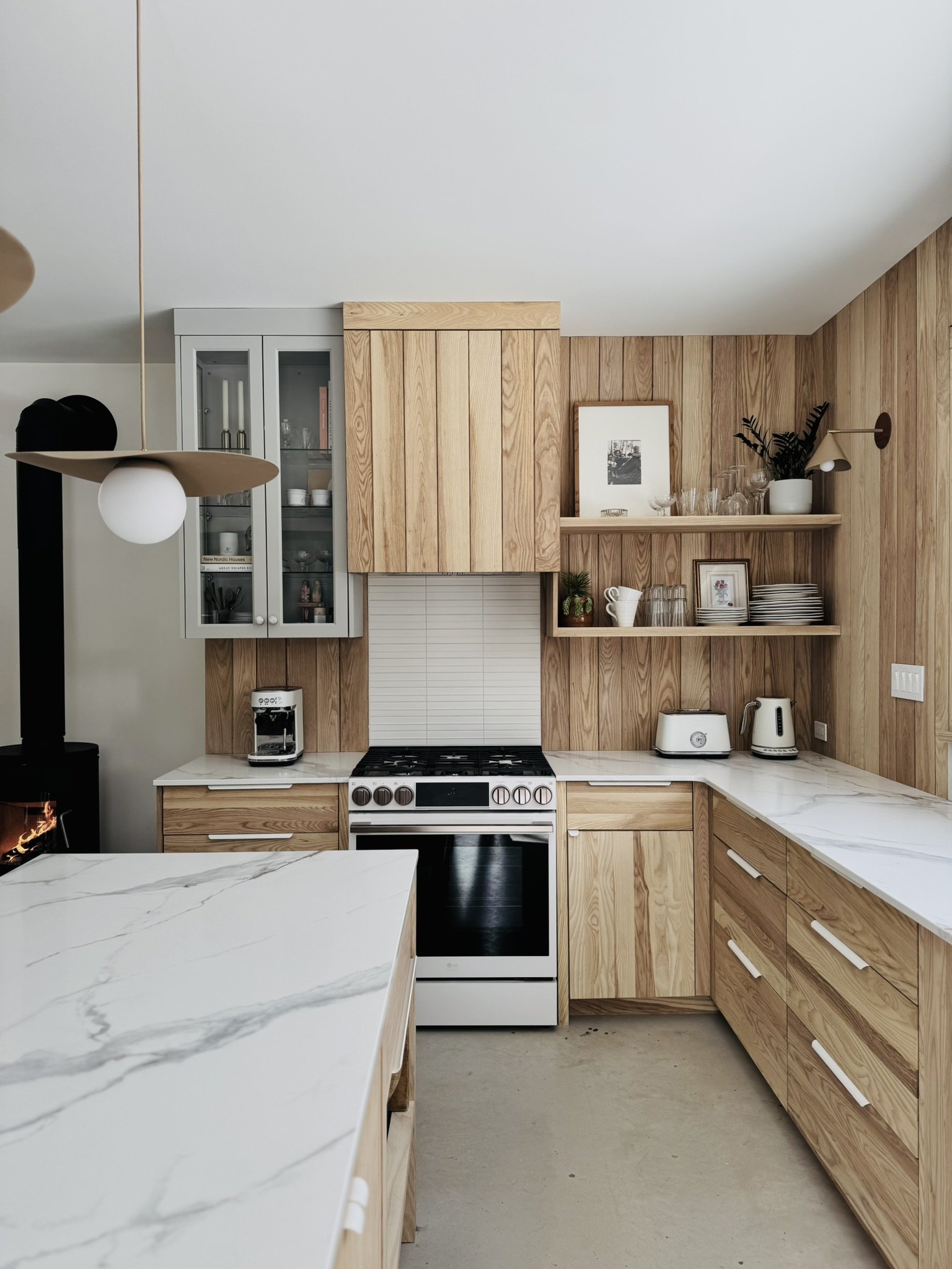 Modern Ash Wood Kitchen at Hinterhaus 41 by Elevïn Design Studio with LG Studio Appliances by Nate Berkus – Photo by Brad & Shawn Hernden