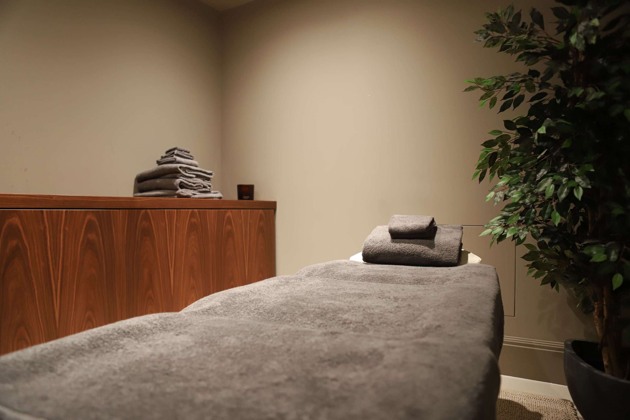 Serene, cosy massage therapy room