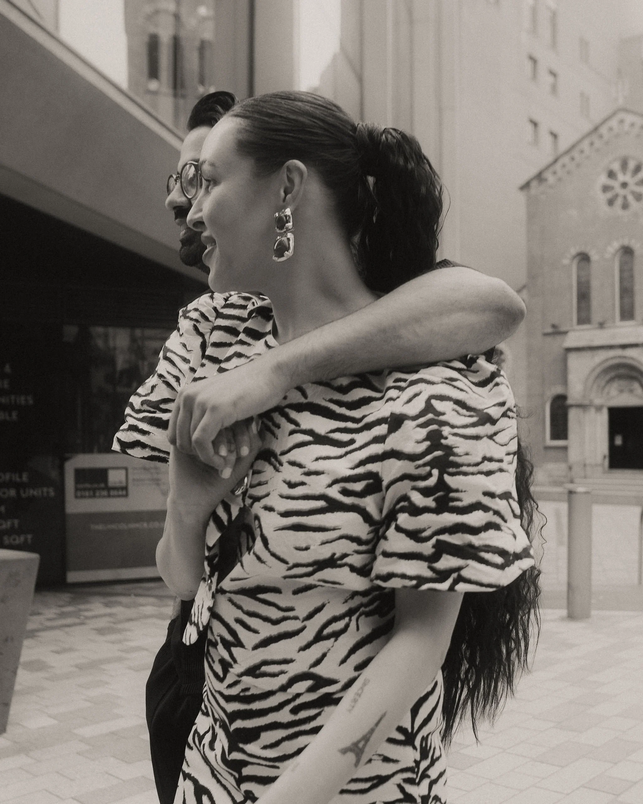 Black and white engagement portrait of couple in Manchester