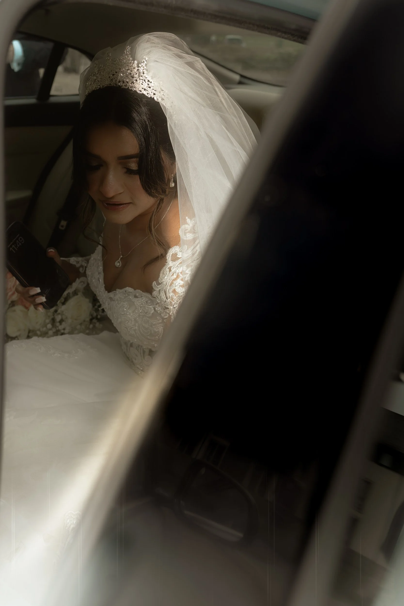 bride gets into the limousine