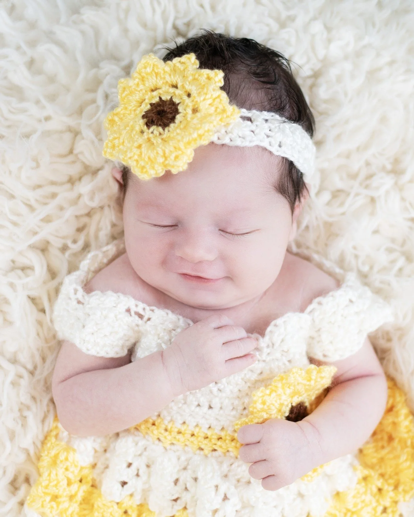 Born to shine like a sunflower in spring 🌼✨ A tiny miracle dressed in warmth and wonder. #AgooFamilyPhotography #NewbornGlow #SunflowerSnuggles #CrochetLove #MichiganPhotographer #LittleRayOfSunshine 🌻👶📷