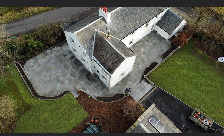 Some aerial shots of our most recent job near Kilmalcolm where we massively changed the landscape of this property. We laid close to 200 metres of grey sandstone paving and replaced retaining walls with Tobermore country walling. 
Safe to say this wa