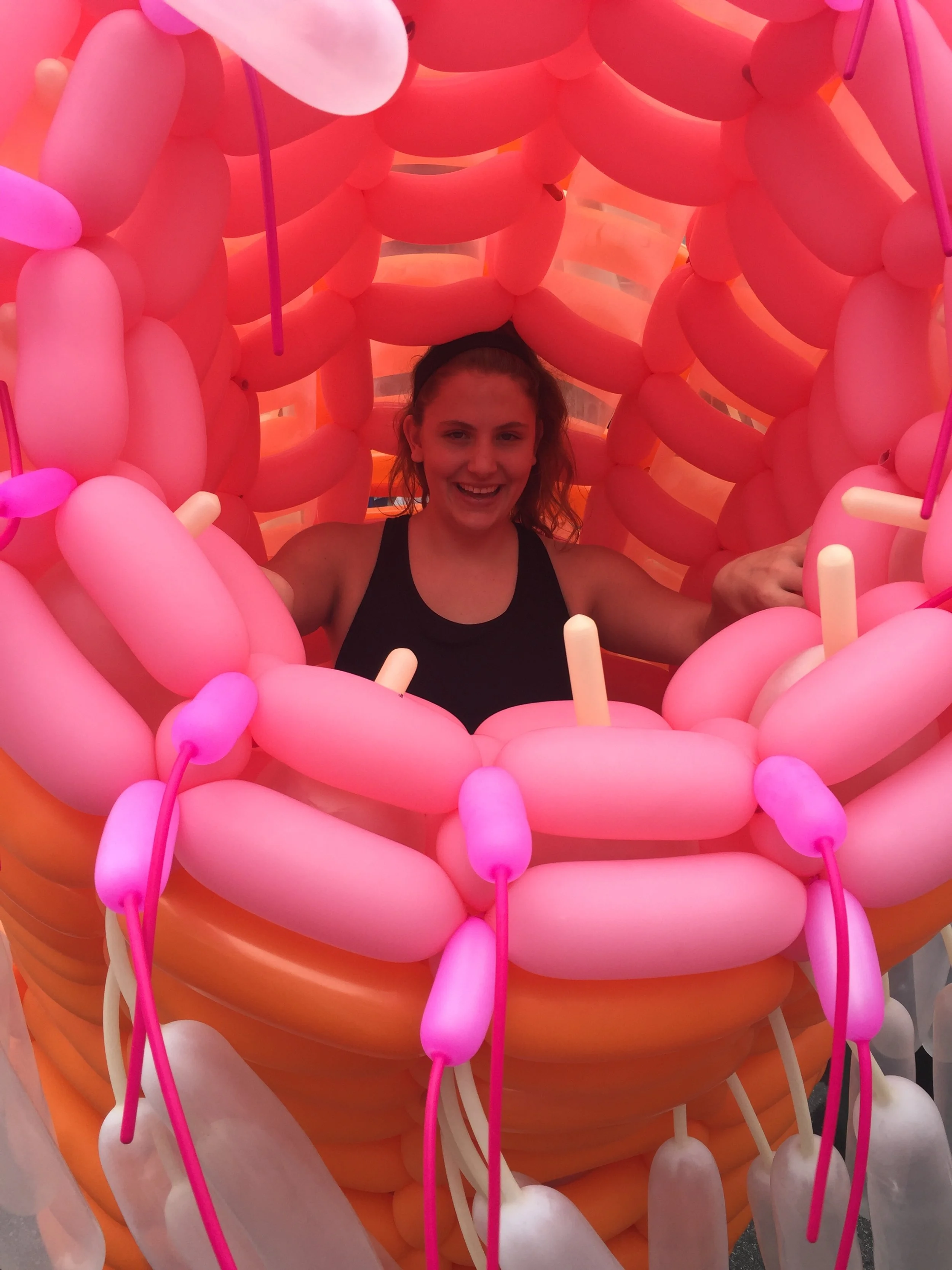 Dancer in Artisphere Parade, wearing Jackson Hackenwerth's wearable balloon art