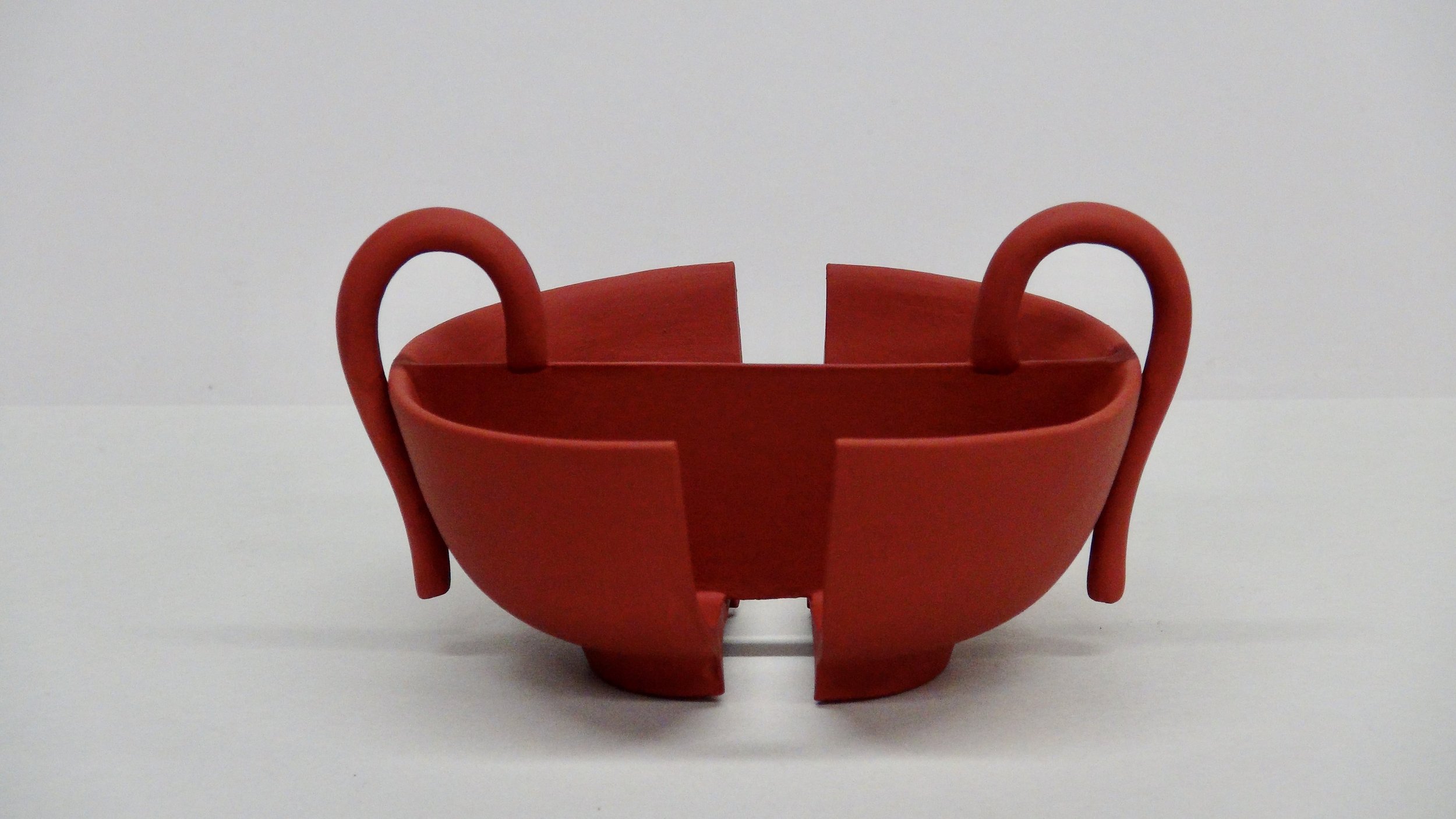  “Cut Cup, Red” was an early favorite:  non-functional, but clearly a vessel, retaining a sense of “cupness.” 