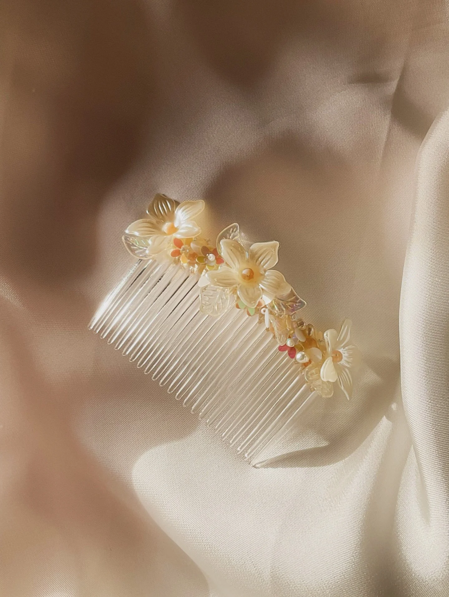 Clematis hair combs - with coloured peach, pink and white beads and sequins. Order your own 💌