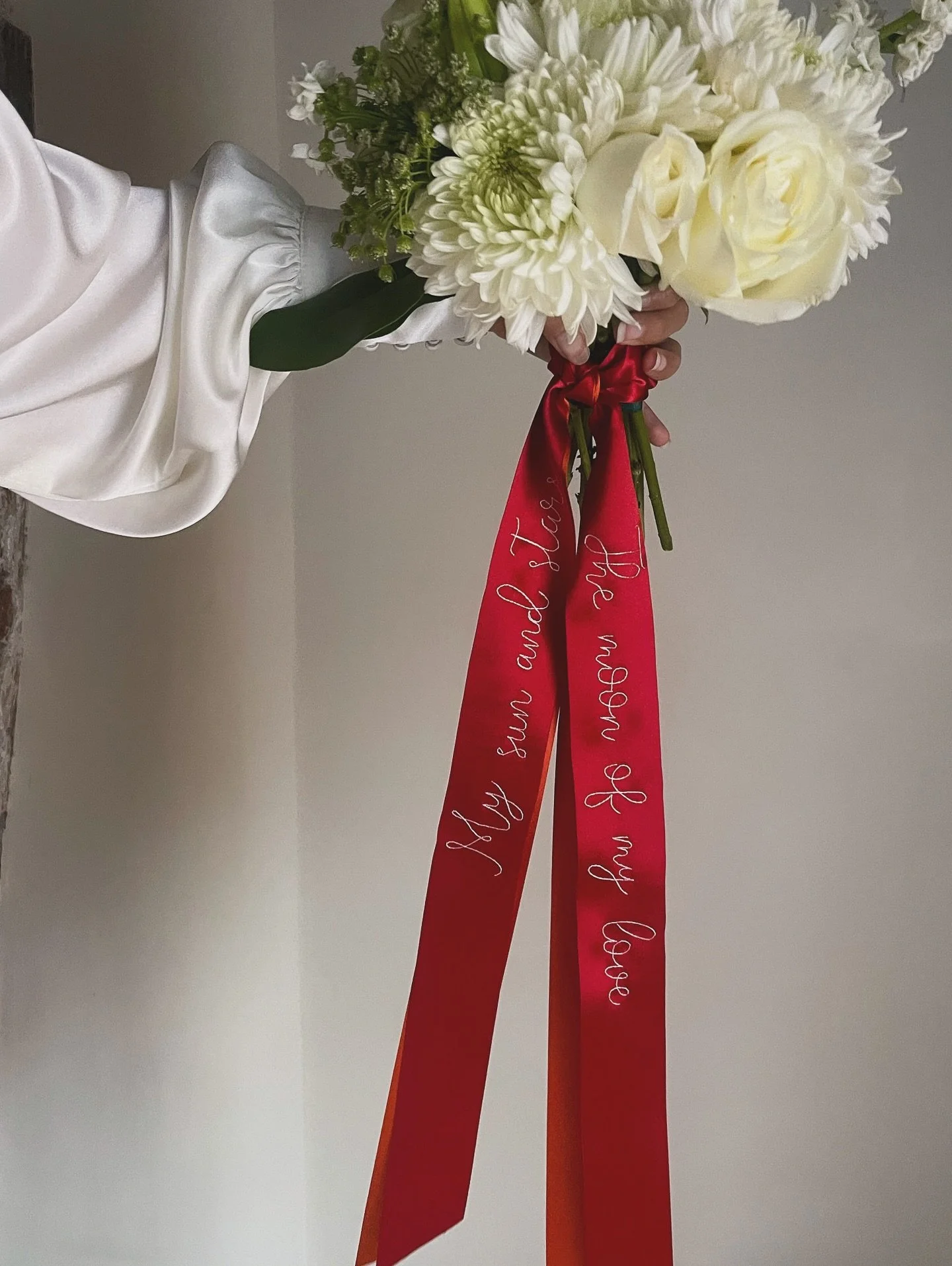 My sun and my stars, the moon of my life
A subtle elegant Game of Thrones monogram for your wedding day.
Customise your bouquet ribbon with designs starting for £45
#gameofthroneswedding #weddingmonogram
