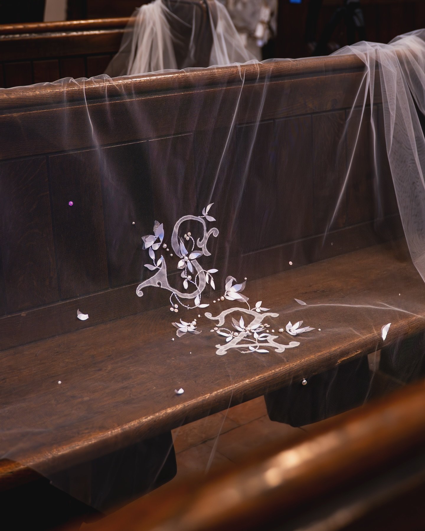 Our agapanthus veil design. Imagine your and your partners initials hand embroidered into your wedding veil. This design is made to be customised, with hand cut petals, sequins brands and a gorgeous curling font. 
Customise your own wedding veil and 