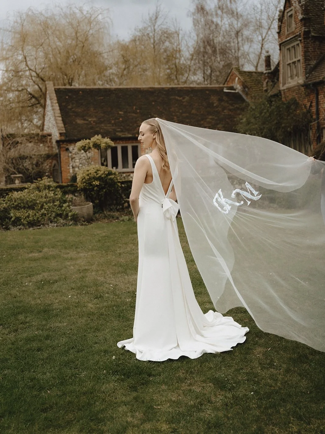 Imagine your initials hand embroidered in silk and pearls on your wedding veil. 
Our gorgeous silk and pearls veil is hand stitched and decorated with hundreds of pearls with flowing waves throughout the letters
Message to design your own veil! 

#we