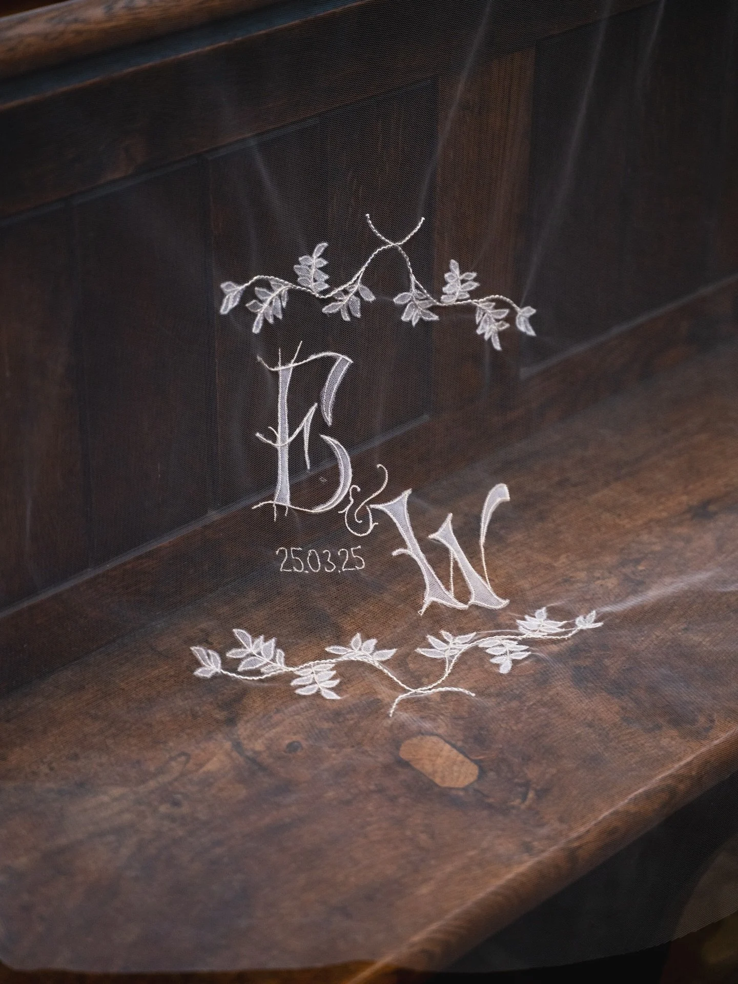 Your initials hand embroidered a real silver, with swirls of leaves and steams. This design is made to customised to suit your wedding. 
Photography by: @megannancy_photoandfilm 

#bespokeveil #weddingembroidery