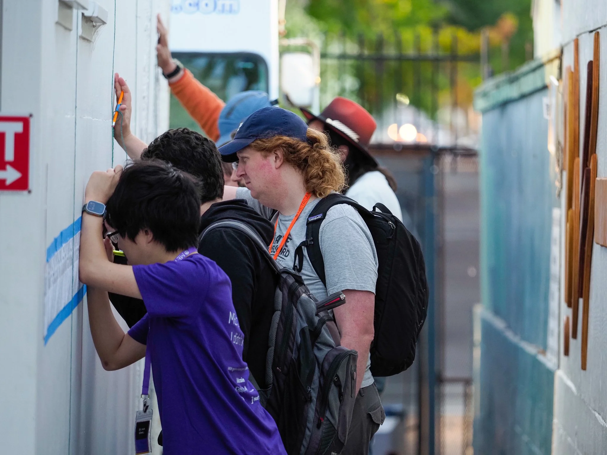 One long continuous crossword the wraps around the side of the building, for them to solve collaboratively