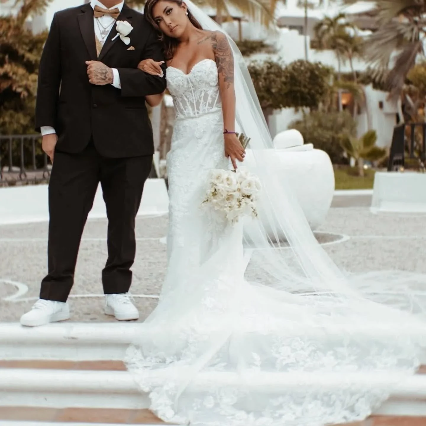 Incredibly honored to tailor this gorgeous tulle and lace gown for this beautiful bride. Not only did I shorten this gown by over six inches, I also re-stitched the lace motifs at the bottom hem to keep this gorgeous part of the original gown design 
