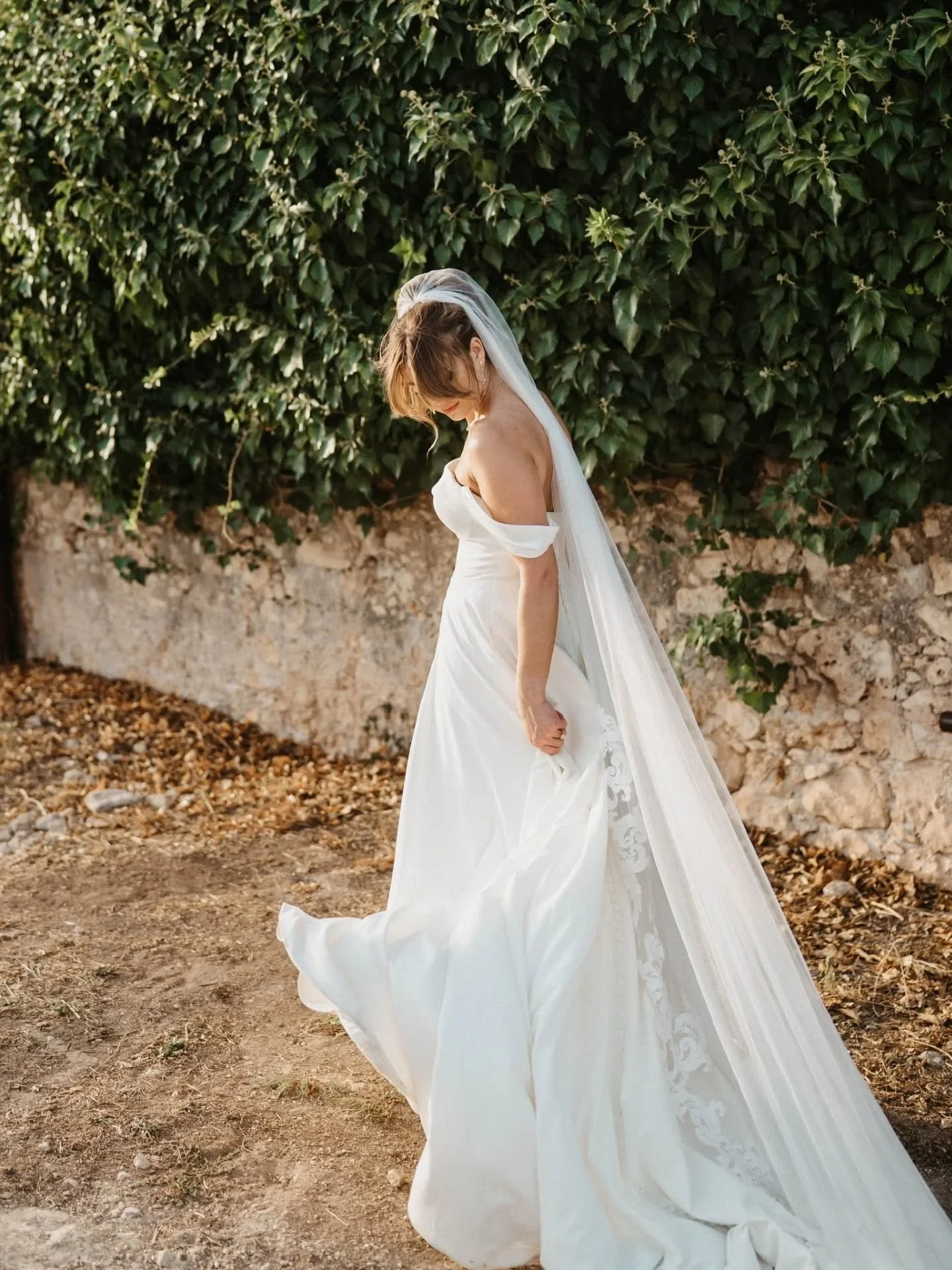 In Love in Borgo Del Carato, Sicily. 

I'm incredibly honored to tailor this bridal dress, including creating the perfect sleeve from this dress's hem. 
I also created a blusher veil  to match this gorgeous lace veil- color-matching the tulle exactly