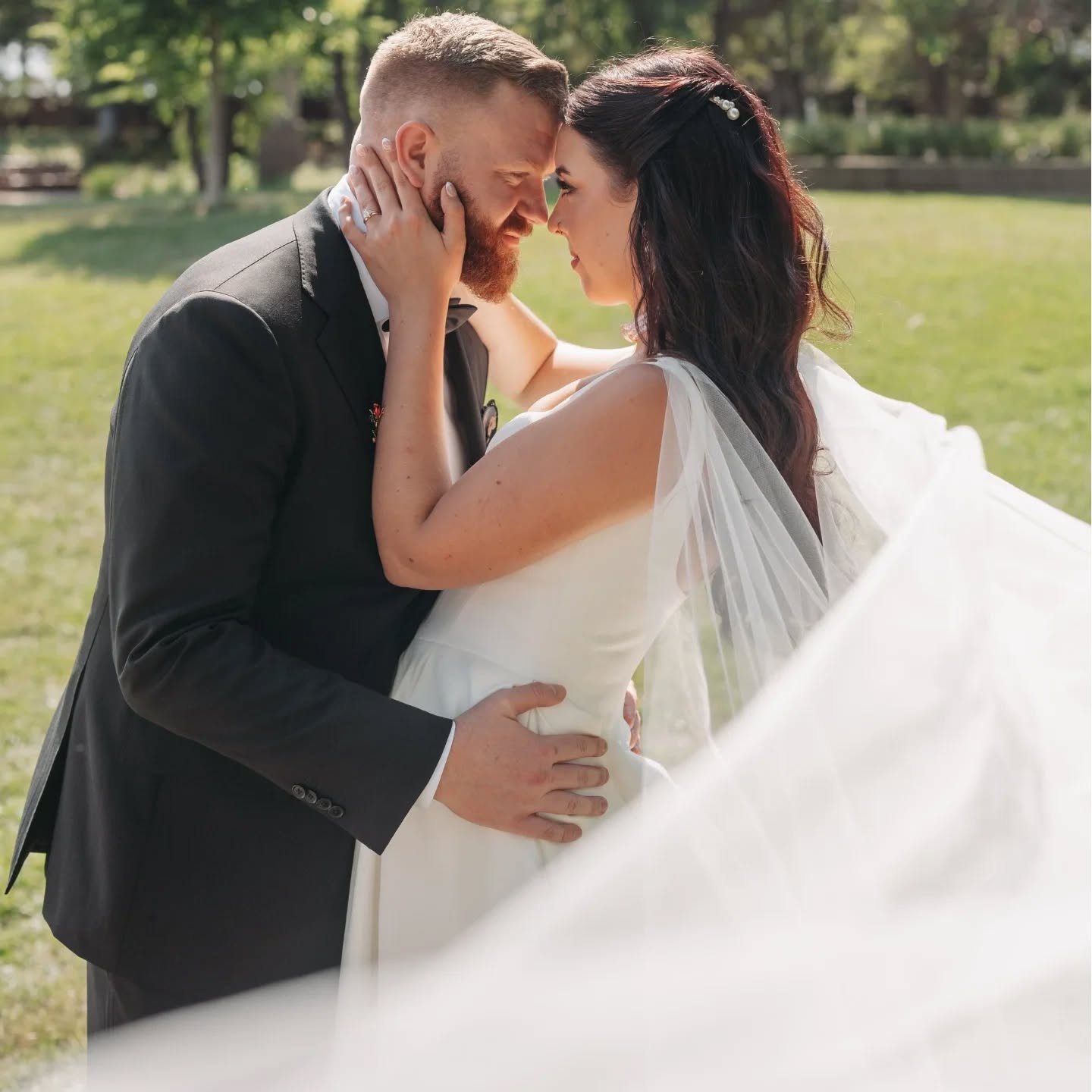 I draped and designed this gorgeous tulle bridal cape to perfectly match this bride's vision and dress. I absolutely adore when veils and capes are dramatic and slightly longer than the train. I tailored this gown for a custom fit in the bodice, as w