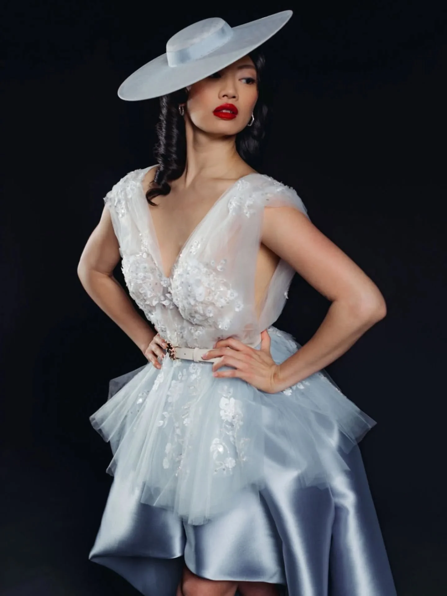 At Nine Lives Bridal, every piece is designed, draped and hand-stitched to the highest level, to fit you and only you, using the same techniques used at top bridal fashion houses. 

I'm a bridal designer and high-end bridal tailor, making custom brid