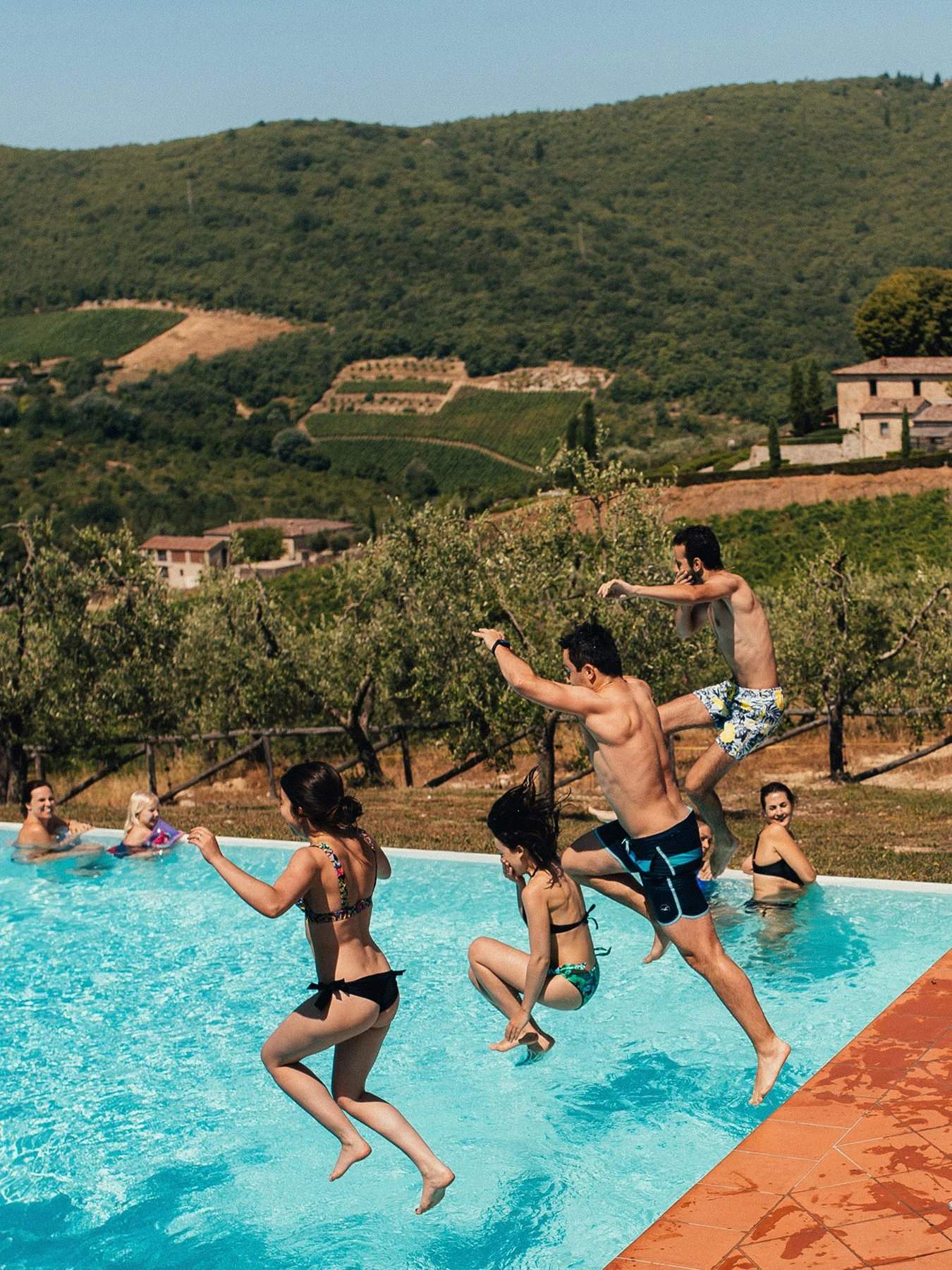 castello-di-meleto-tuscany-wedding-pool-party.jpg
