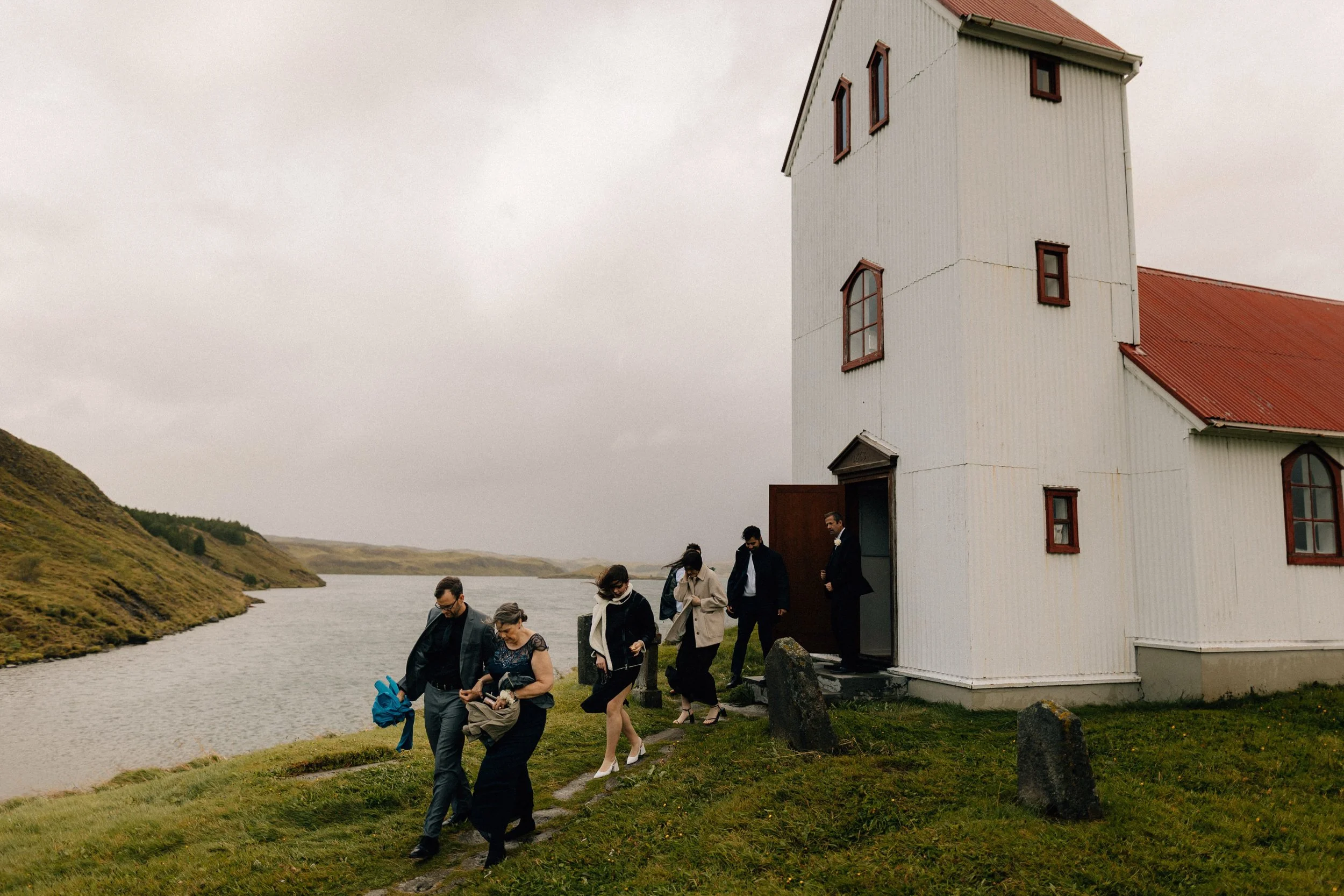 jj020-iceland-windy-church-wedding-lake-exit.jpg