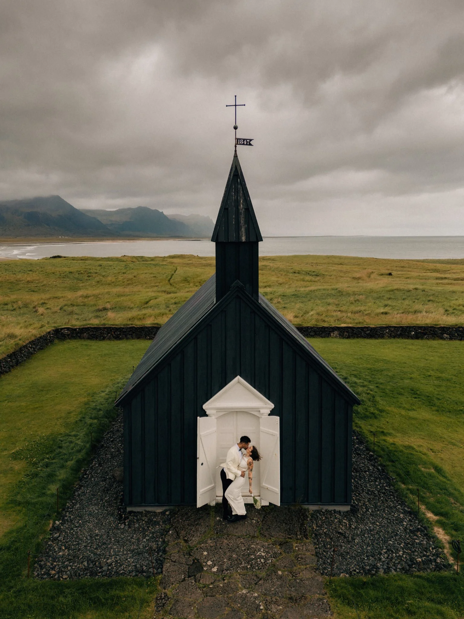 rk016-iconic-black-church-iceland-wedding-portrait.jpg