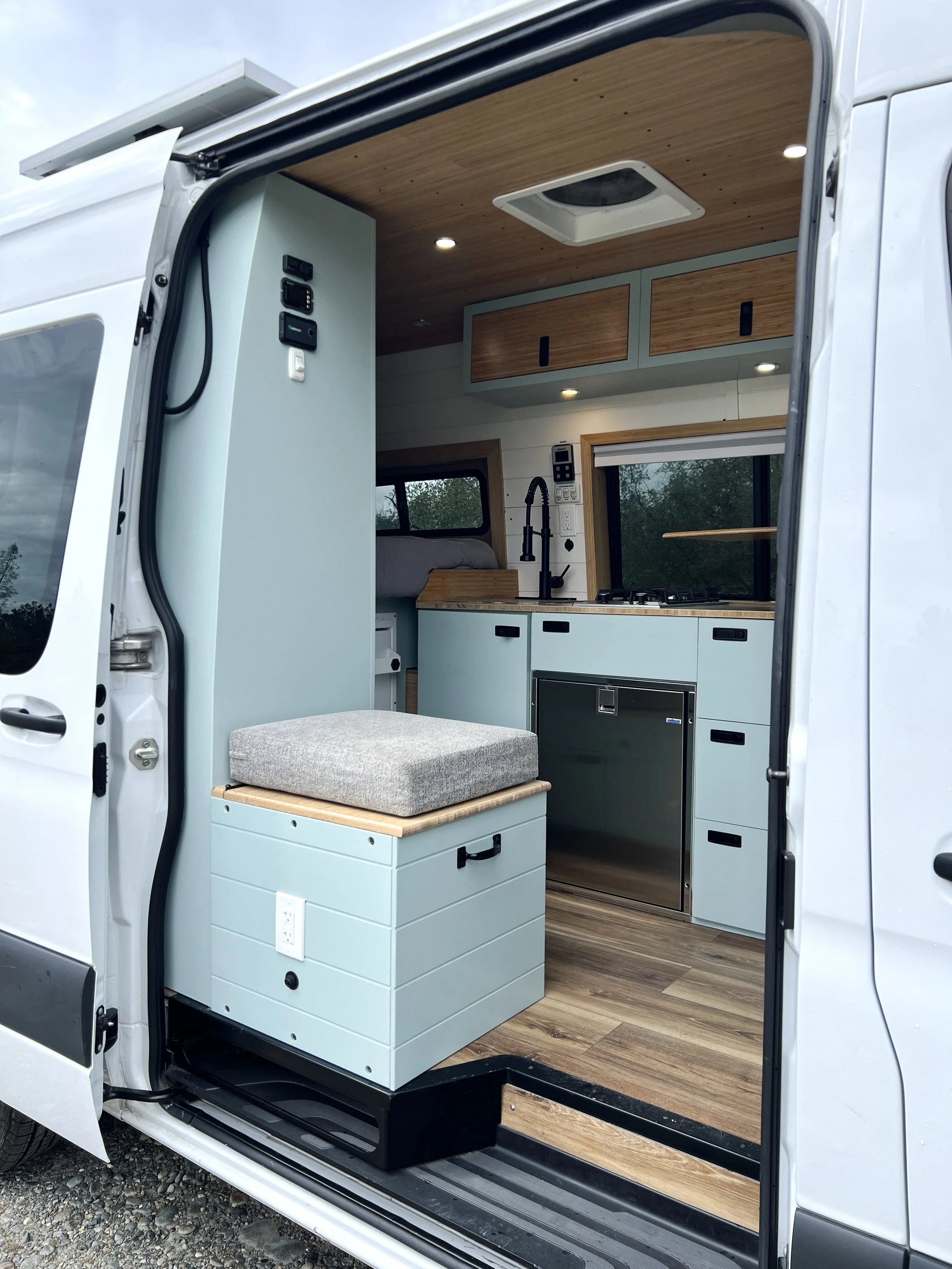Step inside the cozy Aspen campervan rental! Built on a 144" Mercedes Sprinter.
