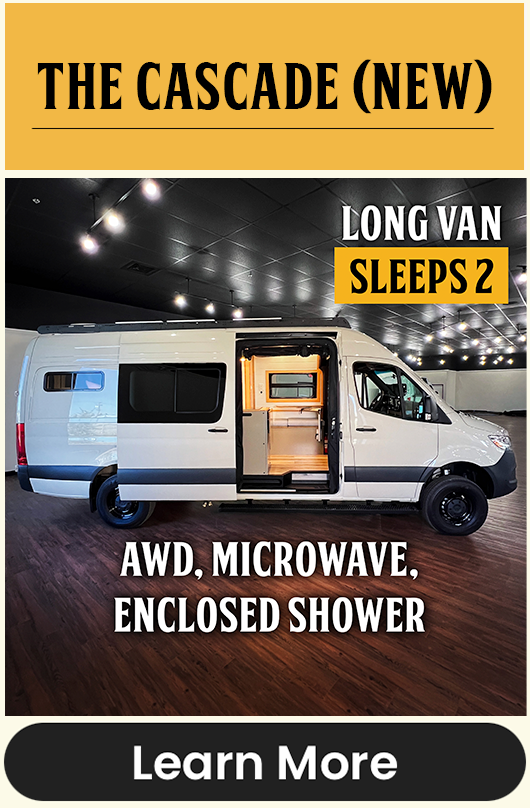 AWD 170" Long wheelbase Mercedes Sprinter Campervan -(Pebble Gray). Interior features a Microwave, King Bed, Enclosed Shower, Lots of Storage, Full Kitchen