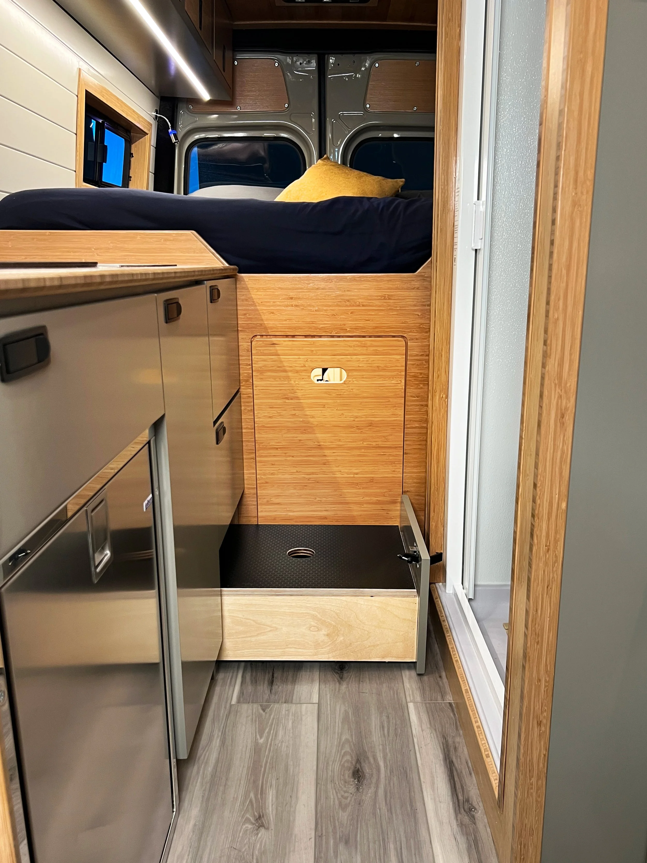 The bottom drawer of the kitchen galley slides out to reveal a convenient step to the bed - and the lid removes to provide extra storage space inside!
