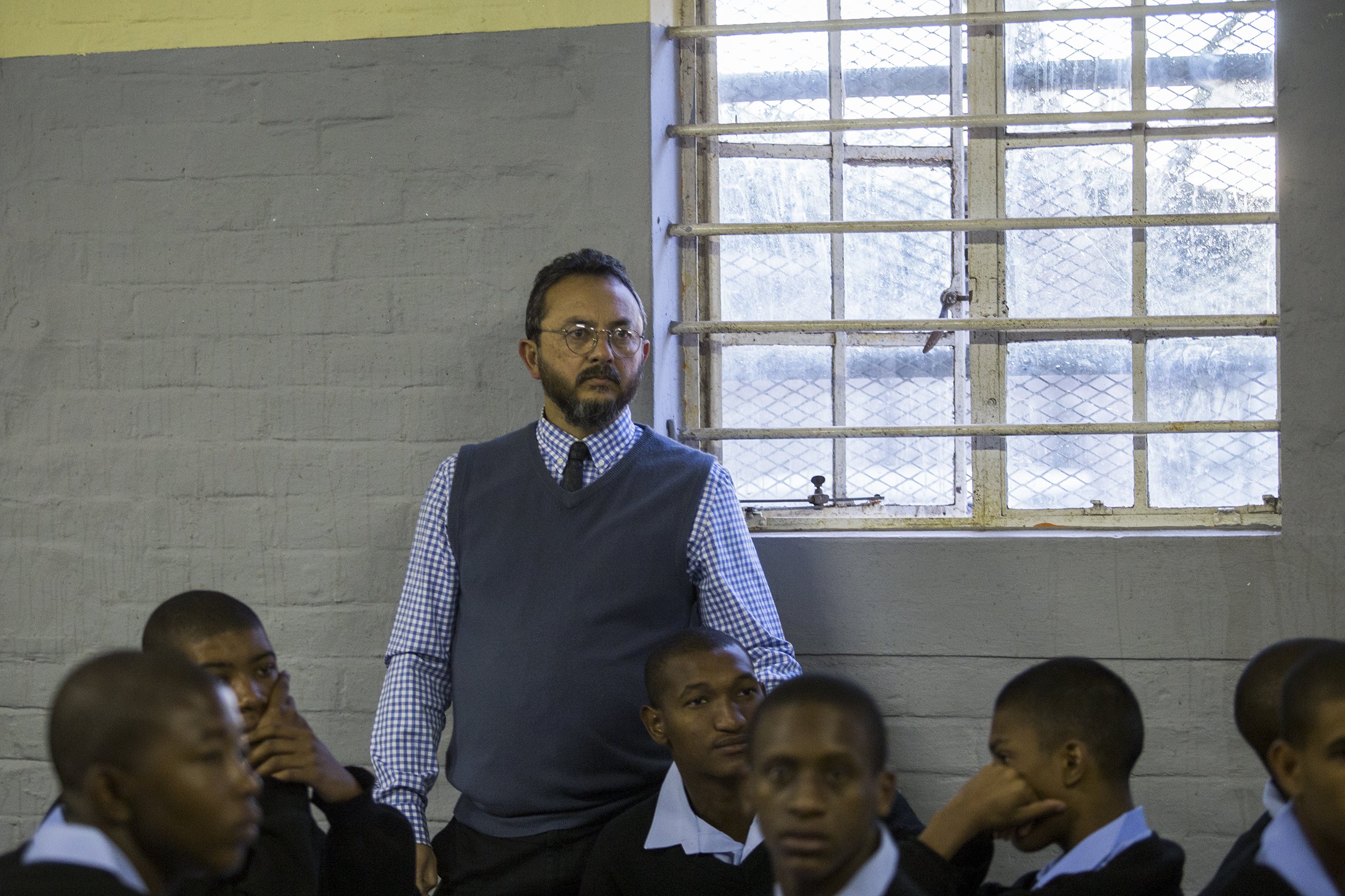 Moosa Mohadick (Mo), principal of the Ottery Youth Care Centre, joins his students in the canteen for morning assembly. April 2017