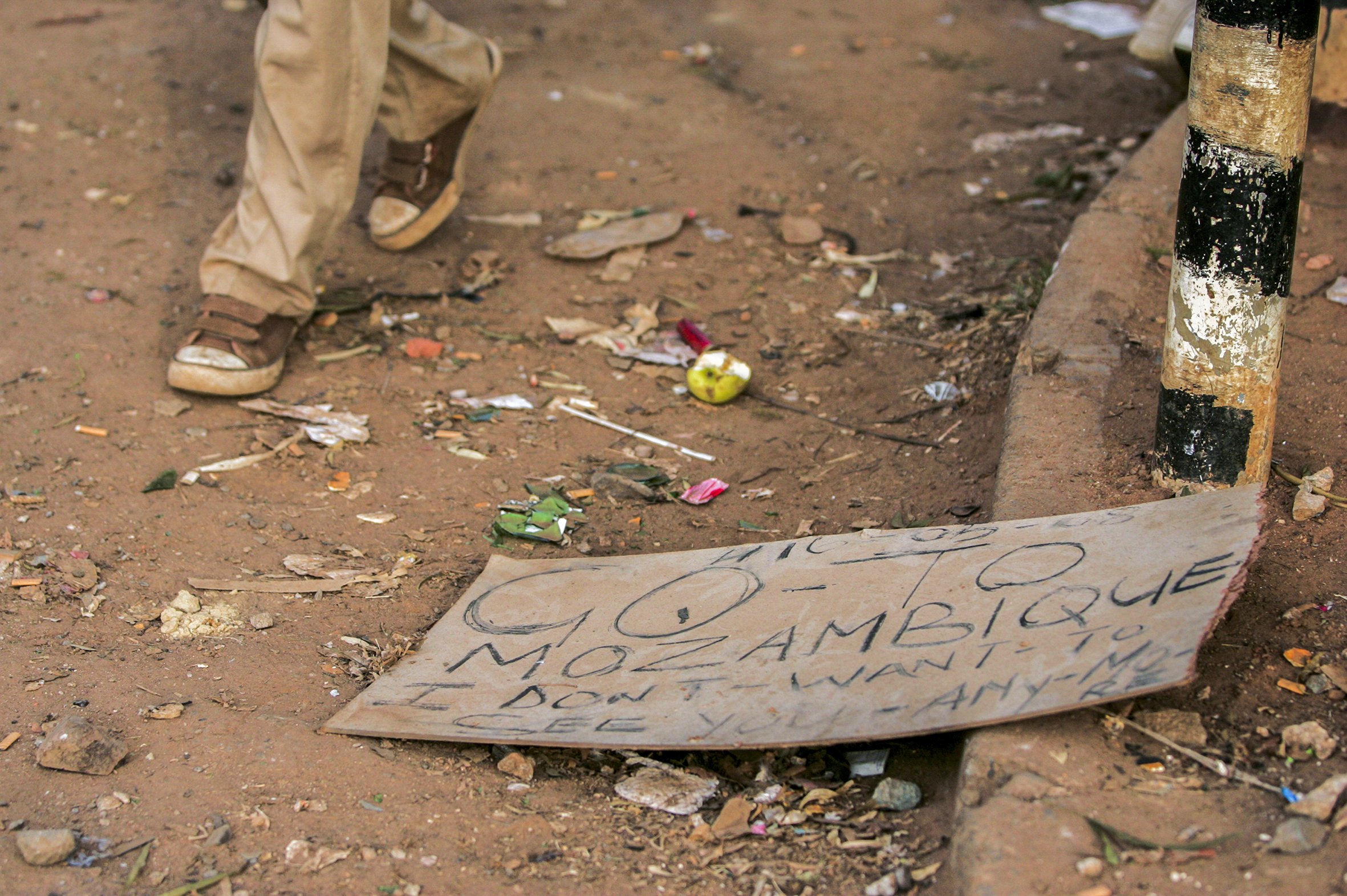 A chilling warning to foreigners lies forgotten on the ground as police, foreigners and locals clash. Makausi, Primrose, east of Johannesburg, South Africa.