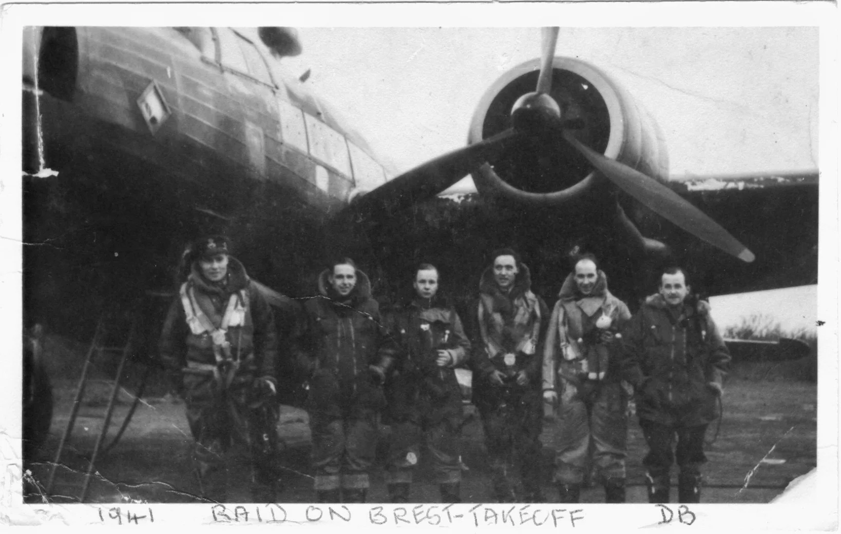 Bruce (far right) with Wellington bomber crew about to raid the battleships Scharnhorst and Gneisenau at Brest in April 1941 shortly before his capture