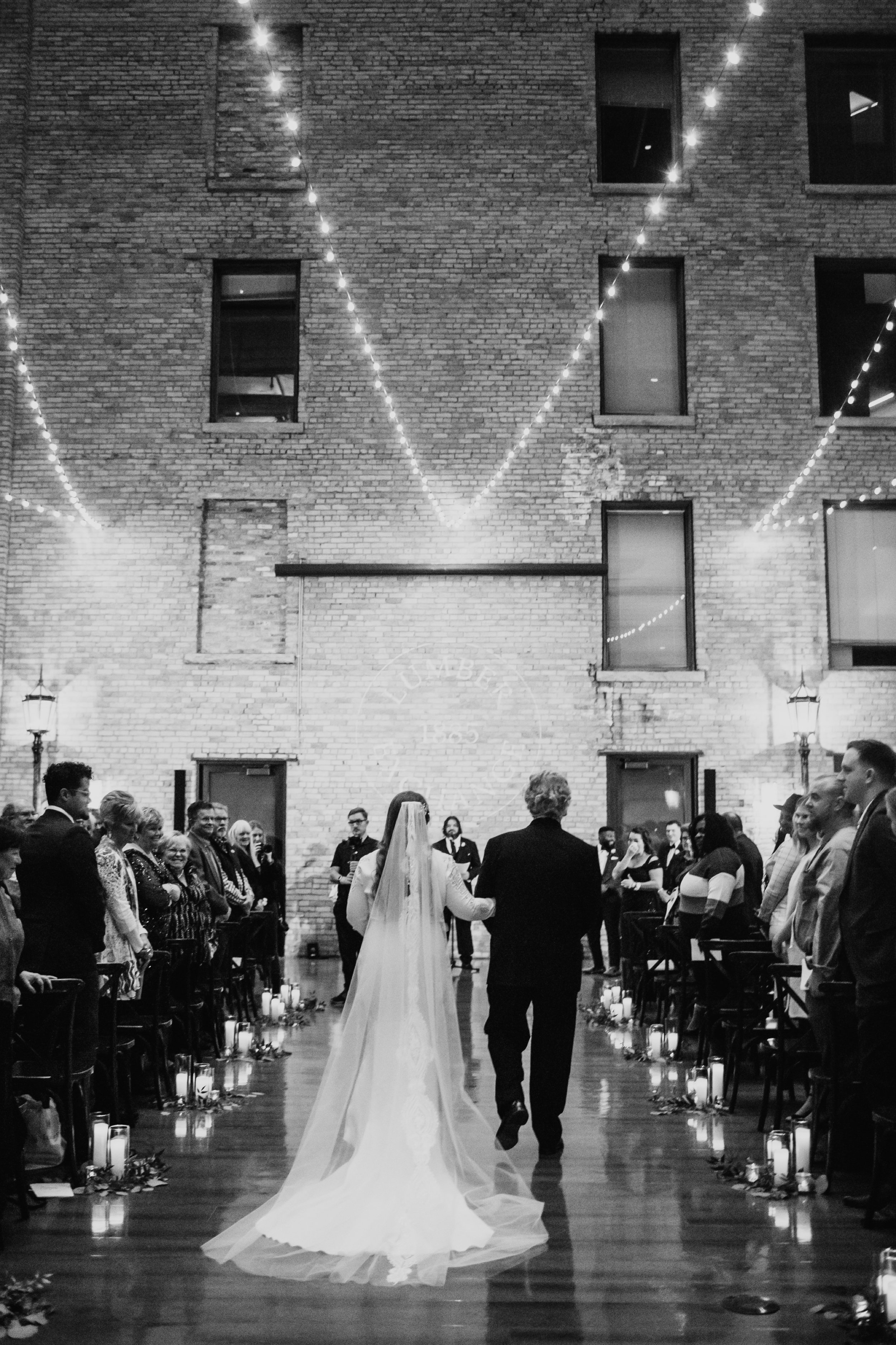 065_A wedding ceremony at The Lumbar Exchange in Minneapolis, Minnesota..jpg
