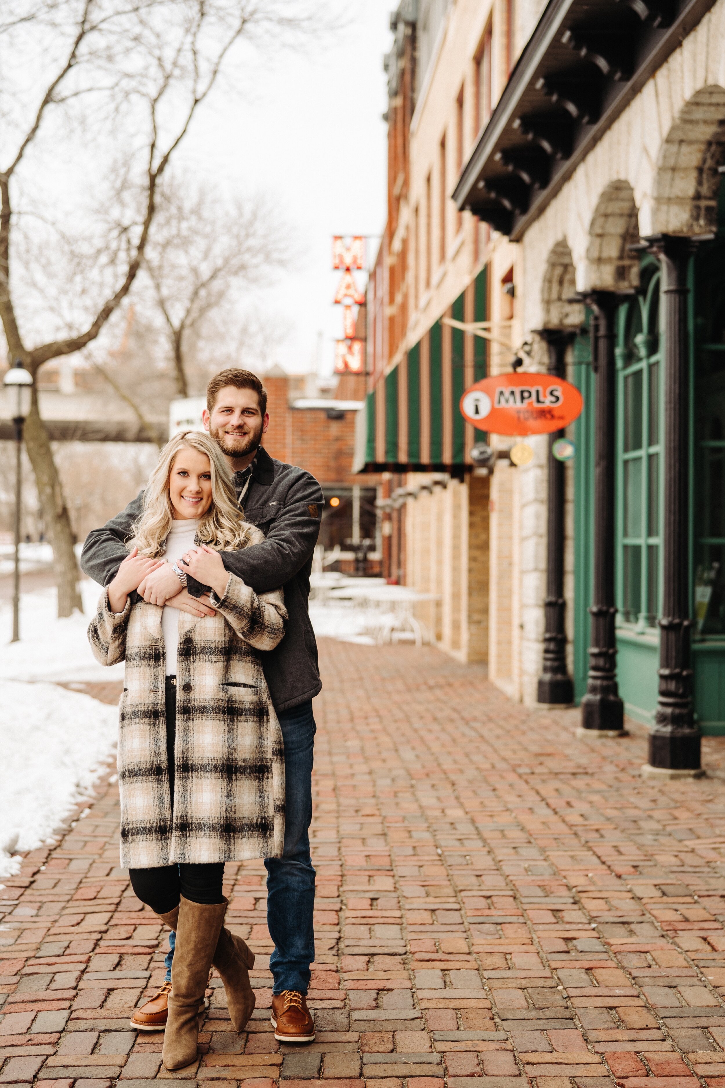 08_minneapolis-engagement-photos-st-anthony-main-8_Winter Minneapolis engagement session at st Anthony main. .jpg