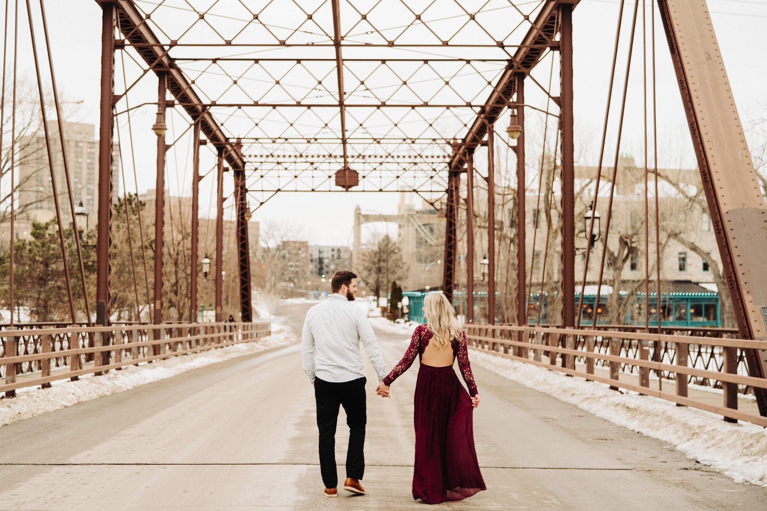 17_minneapolis-engagement-photos-st-anthony-main-54_Winter Minneapolis engagement session at st Anthony main. .jpg